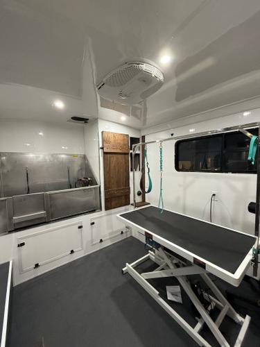 The interior of the grooming trailer, focusing on the left side.