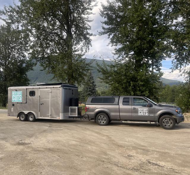 A profile photo showing the Revy Ruff Cuts truck and trailer.